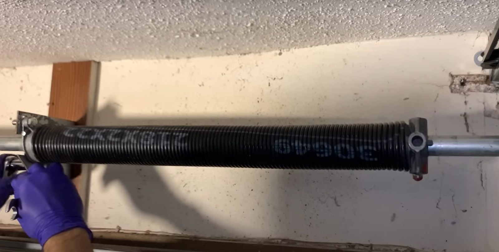 Alt text for the image: "Garage door spring repair services by Expert Garage Door Repair Myakka City, ensuring safe and efficient garage door operation."