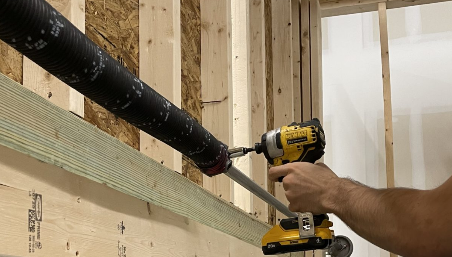 Close-up of a technician repairing a garage door spring in Myakka City, Florida, showcasing professional garage door spring repair services.